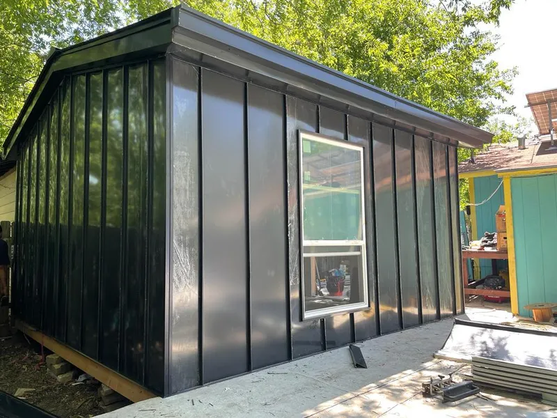 Black standing seam metal wall panels for Roof Inspection in Webster Groves