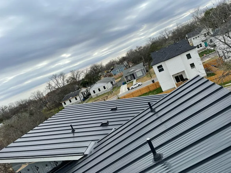Standing seam metal roof panels with vents for Skylight Repair in Webster Groves